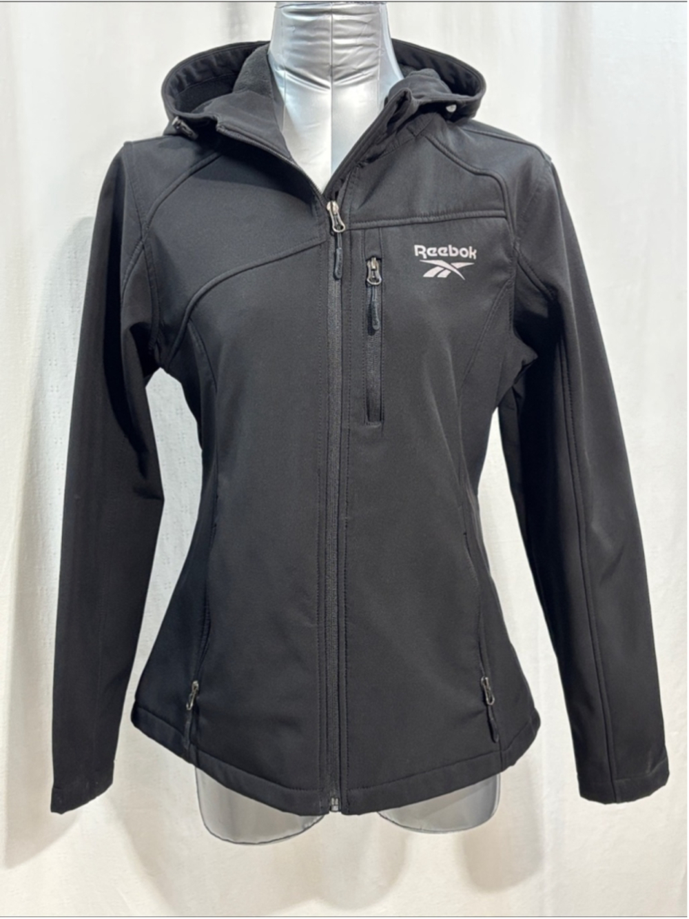 Reebok Women's Black Hooded Softshell Utility Jacket with Fleece Lining comfort